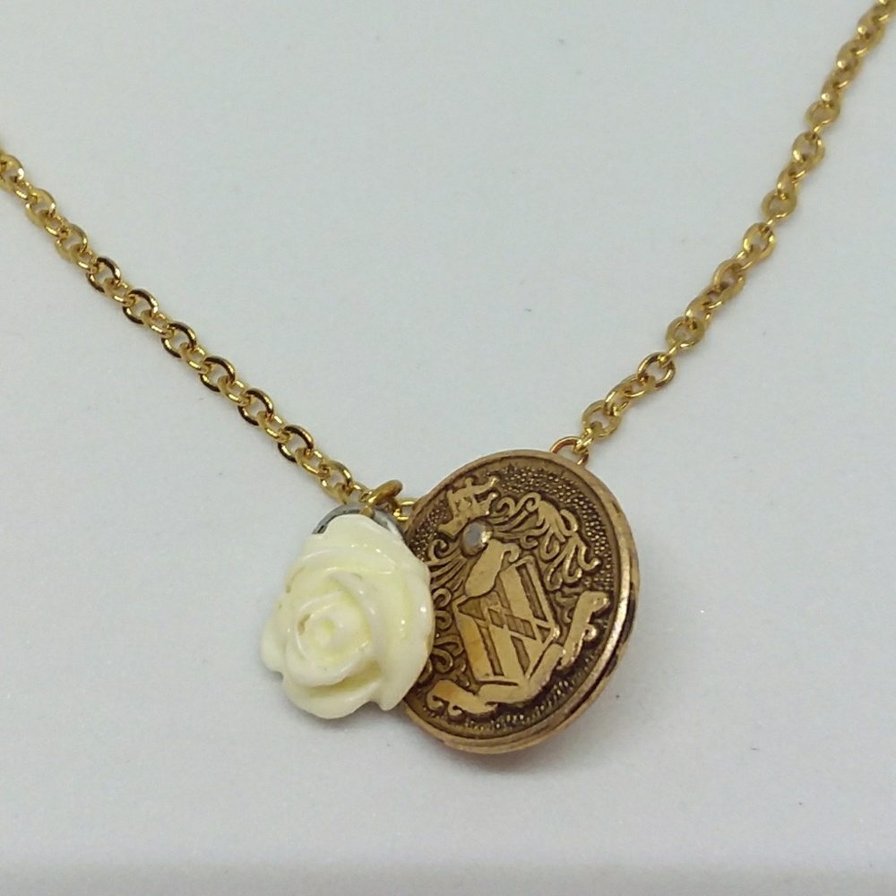 Rose and Crest Gold Tone Necklace